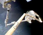 STS-100 robotic arms maneuver (NASA)