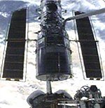 STS-109 Columbia grapples Hubble (NASA)