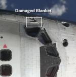 STS-114: damaged thermal blanket (NASA)