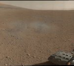 MSL color thumbnail image of landscape and rover wheel (NASA/JPL)