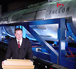 Elon Musk and Falcon launch vehicle (J. Foust)