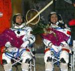 Shenzhou 6 crew after landing (Xinhua)