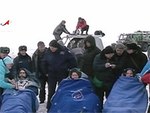Soyuz TMA-06M crew after landing (NASA)