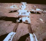 Yutu rover rolling onto lunar surface (Xinhua)